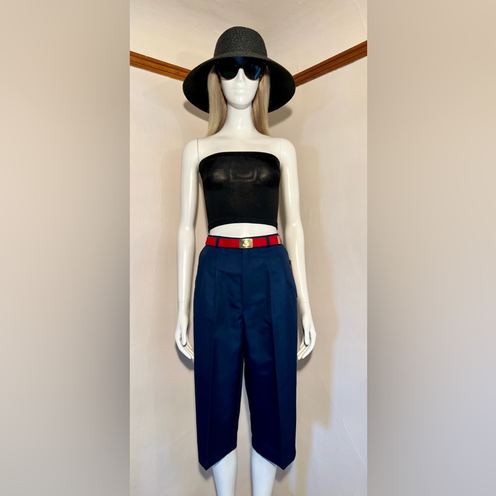 Vintage navy blue pedal pushers with red belt, size 12.